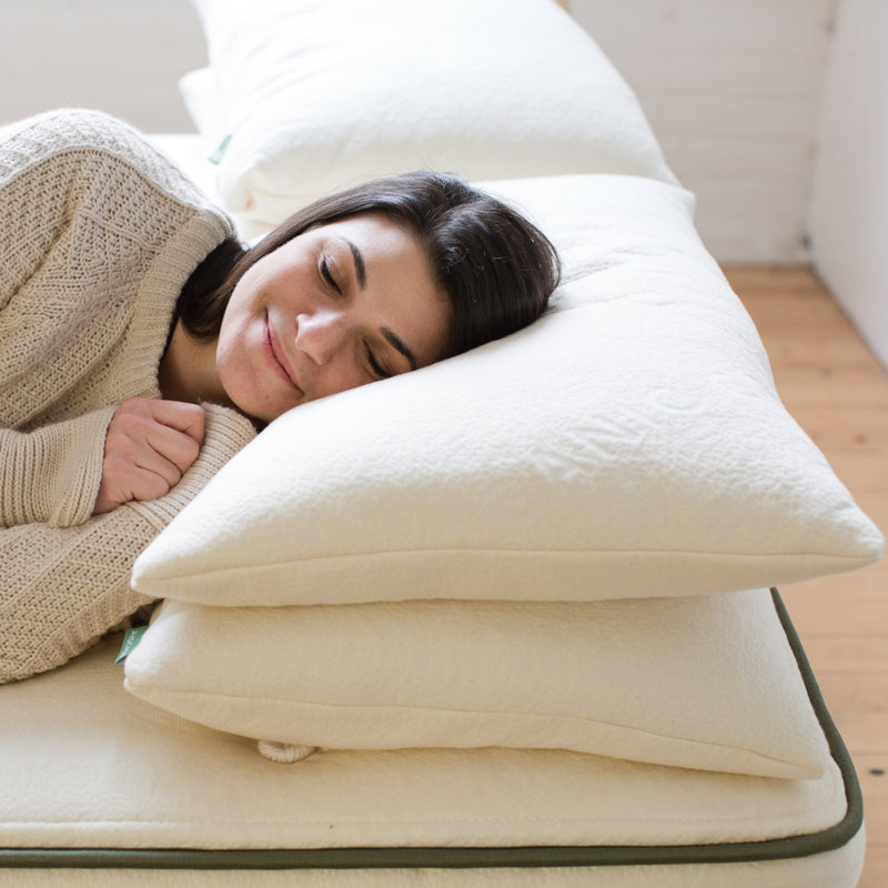 A 2-in-1 pillow that lets you sleep on your bed or at your desk